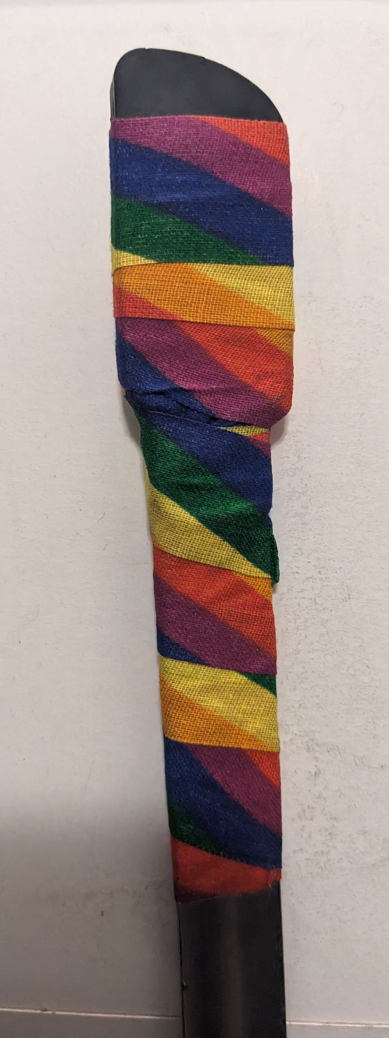 Katana tip wrapped in rainbow hockey tape