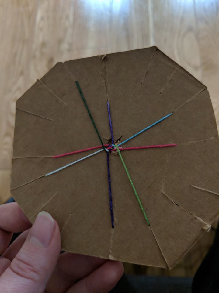 Kumihimo disk with eight strands